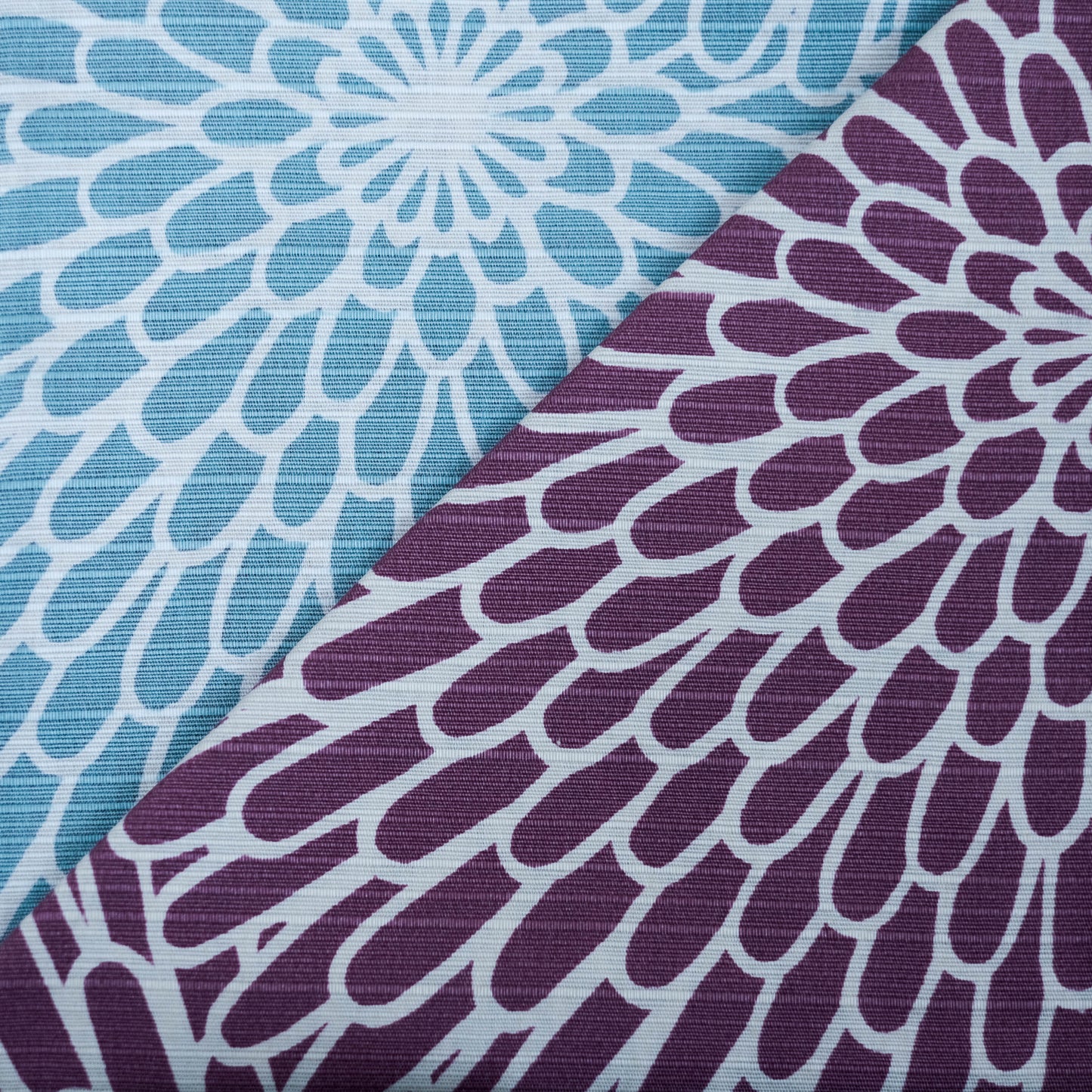 Close-up of a furoshiki cloth with blue and purple chrysanthemum pattern